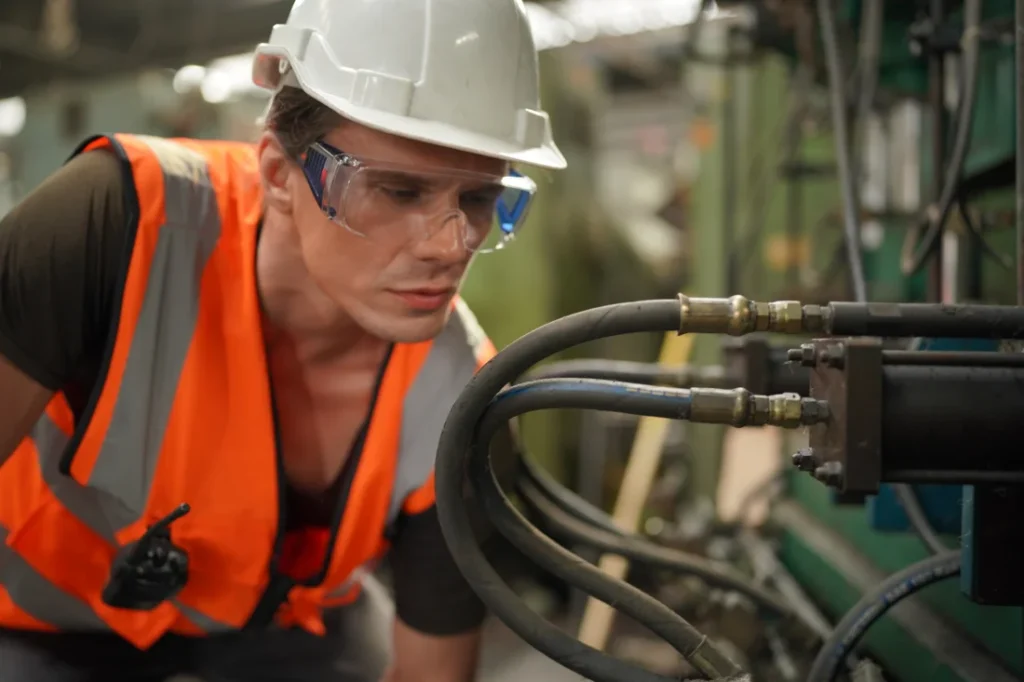 Engineer using industrial solutions in a factory